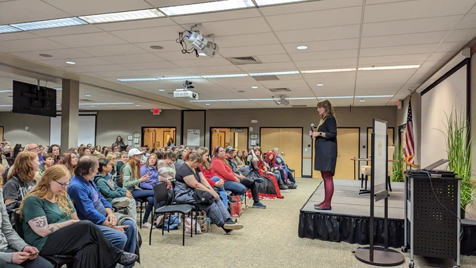 Author Marissa Meyers speaks to a group of 230 readers