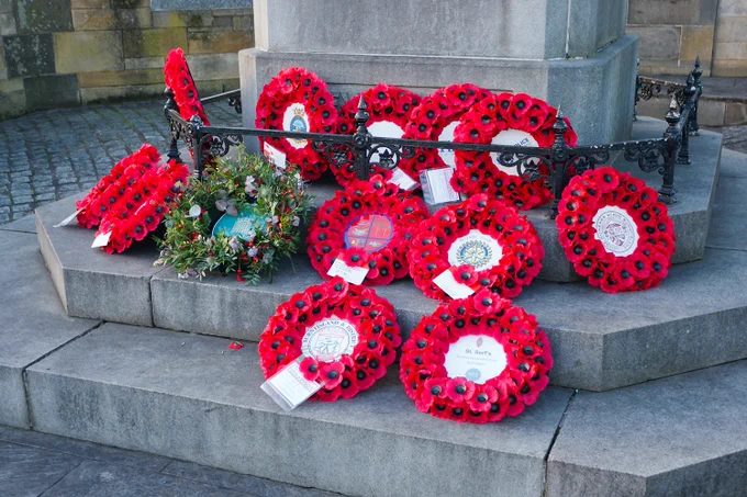 Poppy wreathes from variousorganisations on the steps of Burntisland war memorial