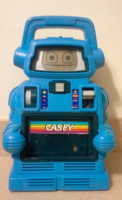 A picture of a robot toy from the 80s, named “Casey”.