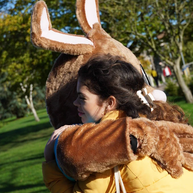 Kent student hugs Kent Bunny 