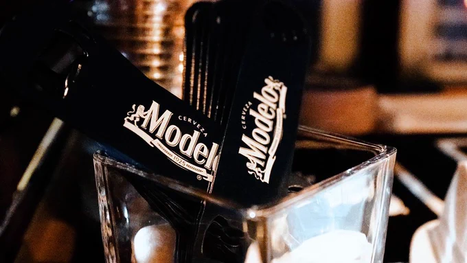 Drink inserts branding by Modelo