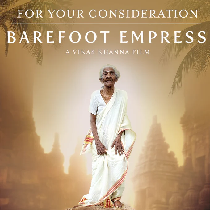 For Your Consideration poster for the film Barefoot Empress - A Vikas Khanna Film. And old Indian woman wearing white clothes looks into camera. Behind her are temples and a brownish, goldfish-ish sky.