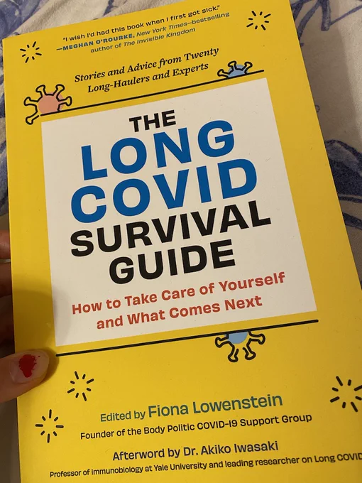 a picture of the cover of The Long Covid Survival Guide. It is yellow and has cartoon coronavirus and sparkle images.