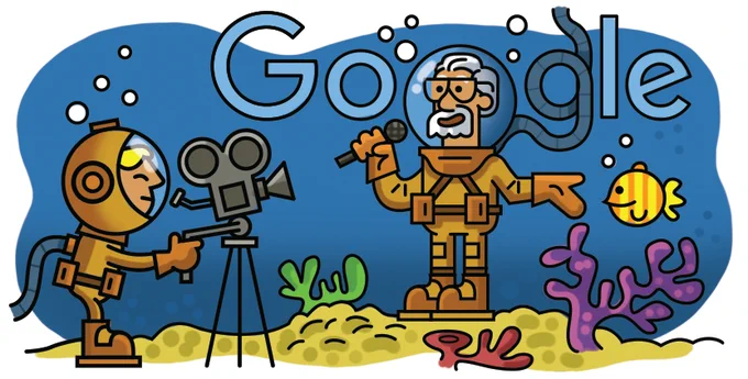 Illustration of Hamed Gohar hosting a televised show under water. He has grey hair and a beard, and is wearing a submarine suit and helmet. A younger cameraman is standing behind a camera on a tripod also wearing a submarine suit and helmet. The surrounding environment is the ocean floor consisting of sea plants, fish and bubbles. The "GOOGLE" logo is floating in the water with a helmet and air tube standing in for the second "O" and second "G". 