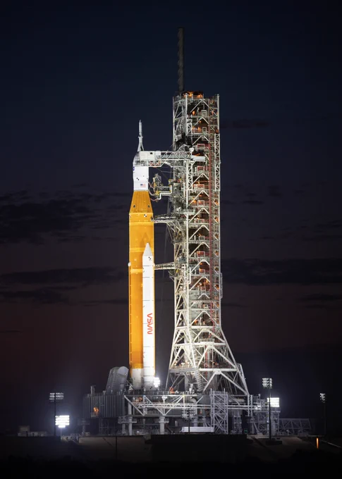 NASA’s Space Launch System (SLS) rocket with the Orion spacecraft aboard is seen illuminated by spotlights atop the mobile launcher at Launch Pad 39B at NASA's Kennedy Space Center in Florida. 

Photo Credit: NASA/Joel Kowsky