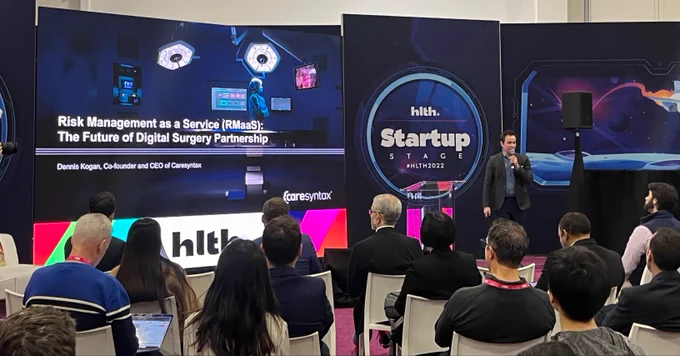 Dennis Kogan speaking at HLTH2022