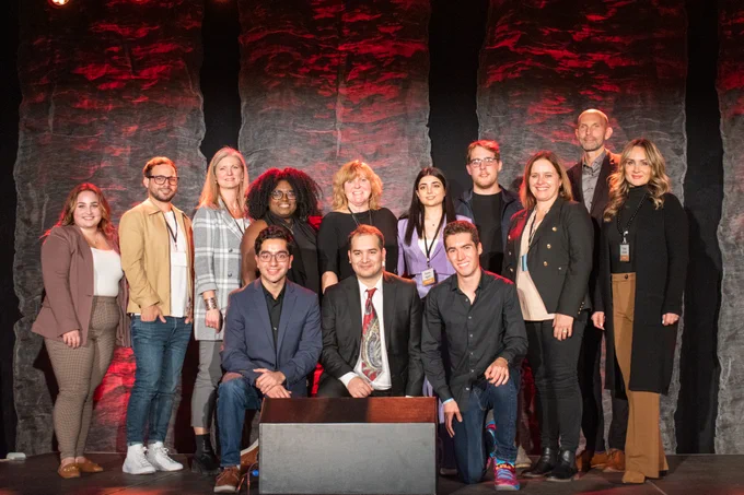 McMaster staff and student entrepreneurs on stage.