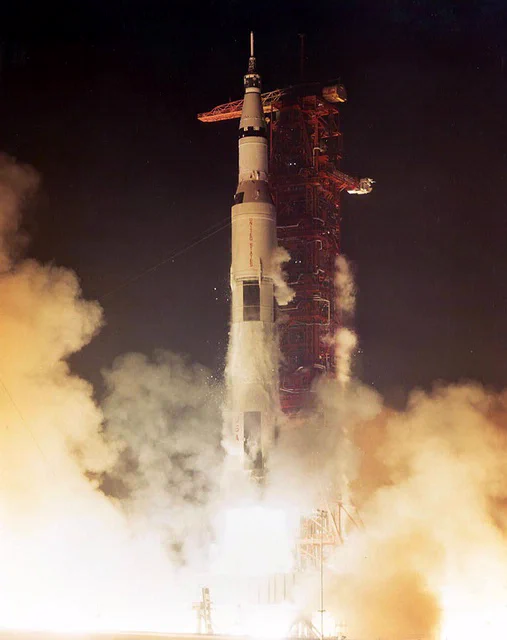Apollo 17, the last of the Apollo Program, launches to the Moon on the Saturn V rocket just after midnight on December 7, 1972.