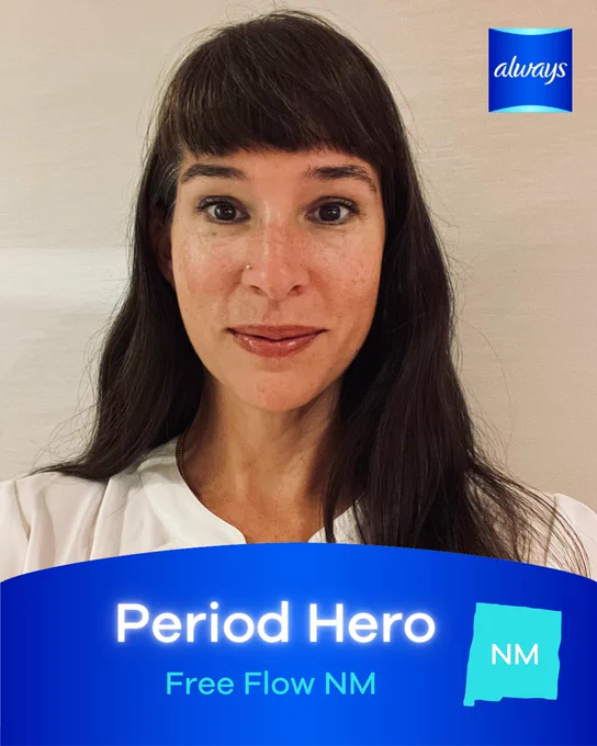 Image of a woman smiling, with a blue arch graphic on the lower half of the image reading, “Period Hero, Free Flow NM.”