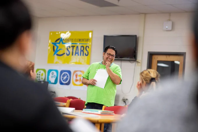 Edu-Futuro staff member Marcelo Ribera leads a Thursday evening parenting resource workshop at Lutie Lewis Coates Elementary School in Herndon.