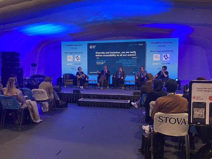 Panel discussion with speakers sat on stage at Event Tech Live 