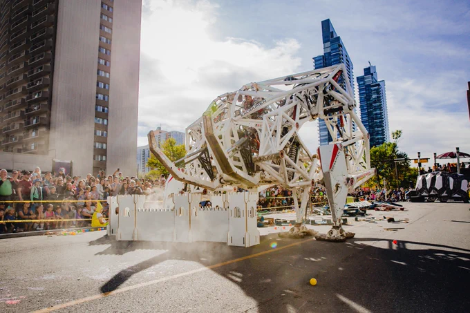 Exosapien crushes a model of a castle made by Fuse 33 at Beakerhead 2022