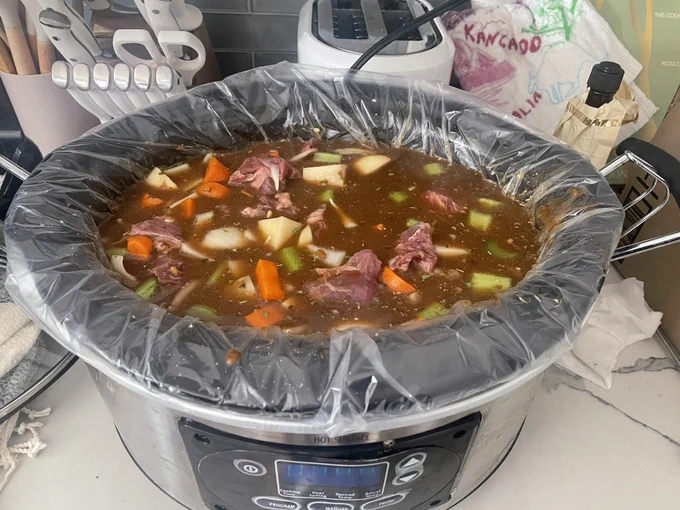 All the meat, vegetables and saucy liquid magic combined and ready to slow cook for 4 hours on high!