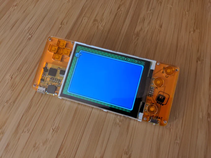 A handheld game console displaying an empty menu.