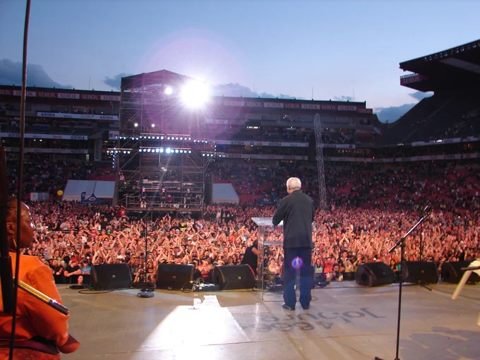 On stage with Nelson Mandela at the 46664 Concert at Ellis Park. Pic by Dan Shout.