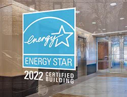 Photo from website: Decal on business office window: Energy Star logo, “2022 Certified Building” underneath.