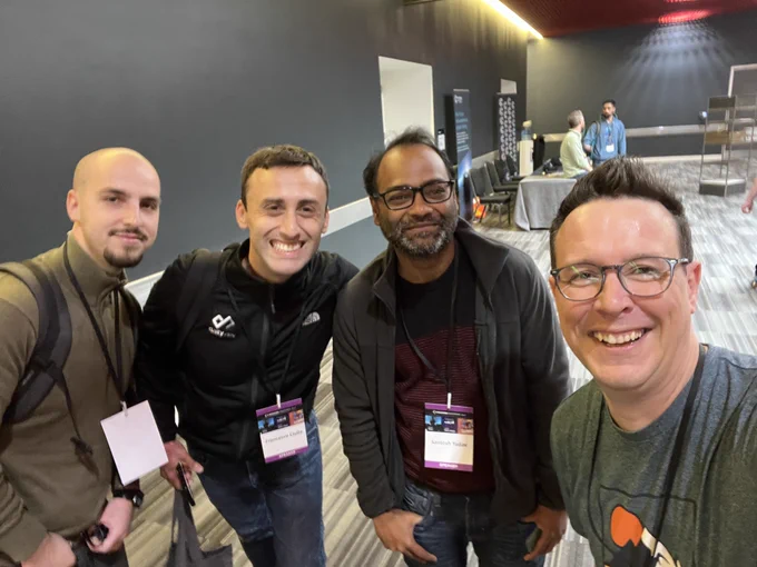 Catlin, Francesco and Santosh with Scott grouped together for a selfie!
