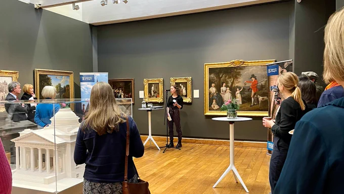A student speaker giving a speech at the event in the Hunterian Art Gallery.