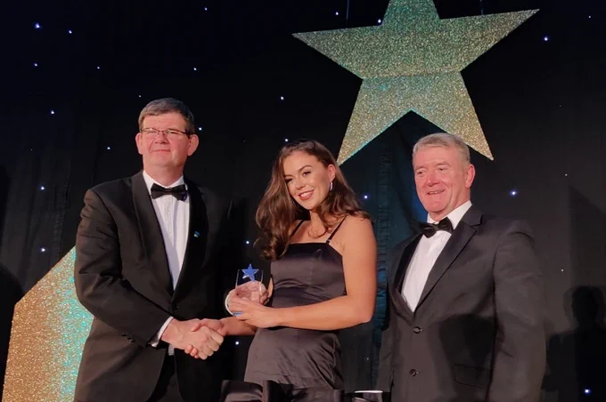 Professor Mark Rogers presents Eimear Lambe with a UCD Alumni Award