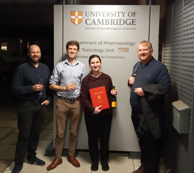 Roxanne with her PhD thesis and (L-R) Nick Pugh, Matthew Harper & David Bulmer