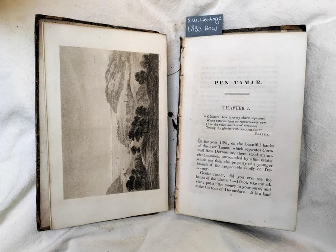 A damaged book, split into two pieces 