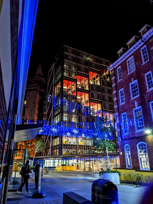 Night-time image of the Christmas lights in John Watkins Plaza, the area outside LSE Library. 