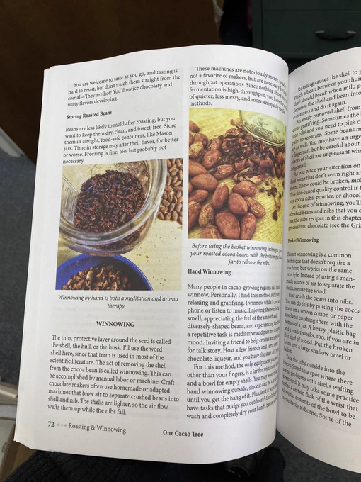 Book pages with photos of cacao bean processing