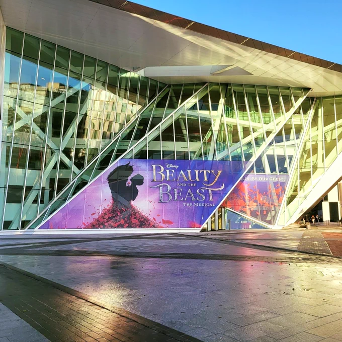 The Bord Gais Energy Theatre in Dublin with Beauty and the Beast signage on its front