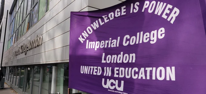 Photo of Imperial College UCU banner next to a college building at the South Kensington campus.