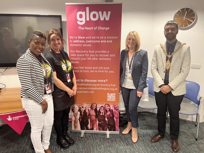 Glow staff members with Stoke-on-Trent City Council Lord Mayor Faisal Hussain 