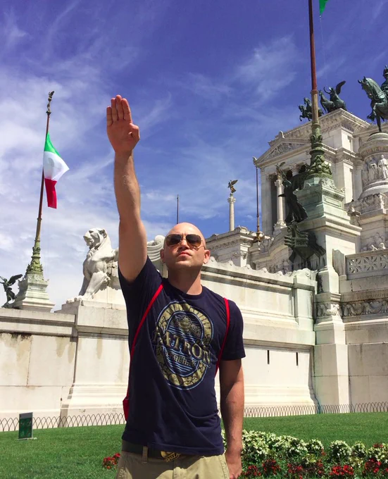 photo shows a man giving a nazi salute