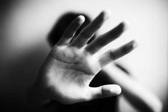 Raised hand in defence