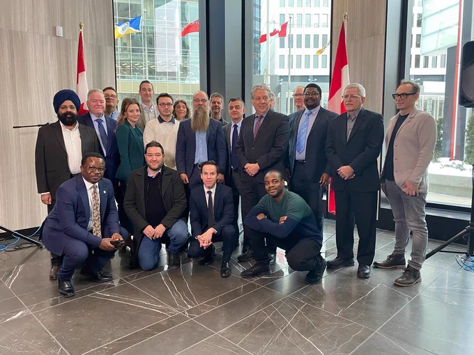 Group shot with Minister Vandal