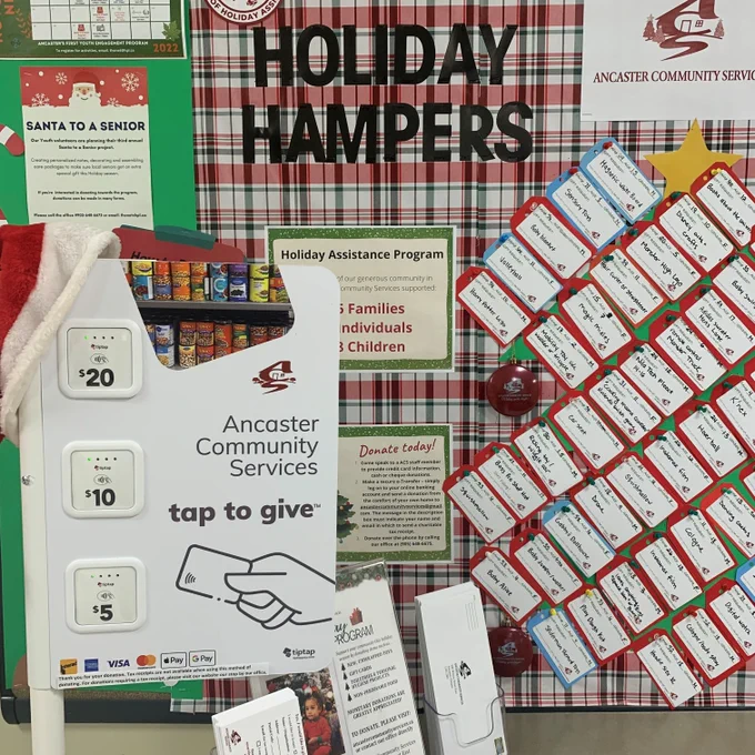 Image of a tiptap device with donation amounts of $5, $10 & $20.