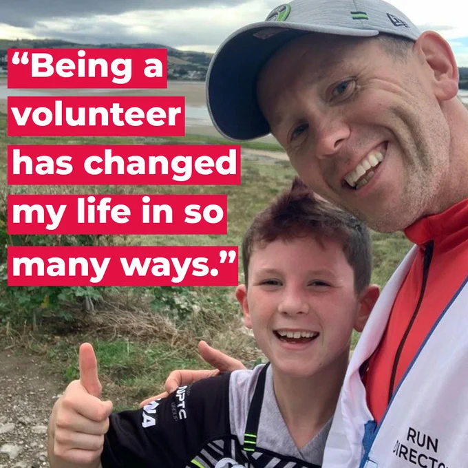 Image of Aaron wearing a white cap and a white parkrun run director bib with his son, who has his thumb up. On top of the image is the following quote - "Being a volunteer has changed my life is so many ways."