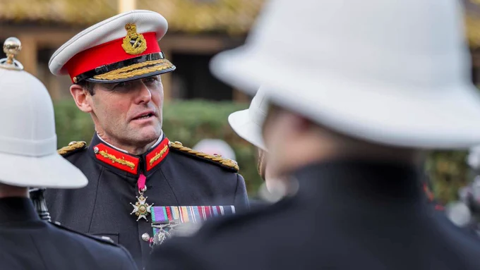 Lt Gen Rob Magowan inspects the guard during the CGRM ceremony
