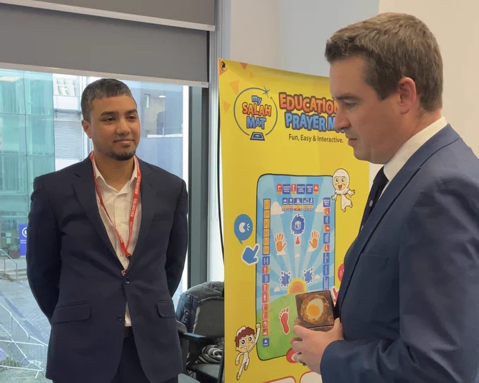 Wales Office Minister James Davies talking to Kamal Ali of My SalahMat.