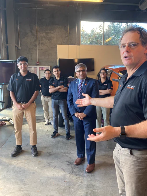 The Deep Orange team and NSF Director Panchanathan gather around listening to presentations at CU-ICAR.
