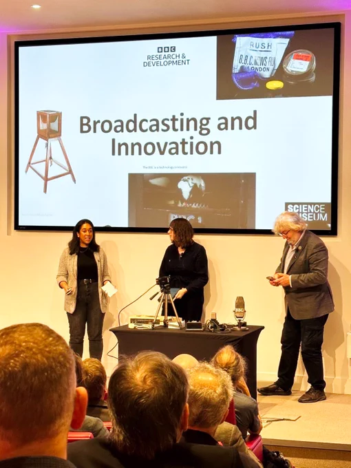 Presenters Rachel Boon, Bill Thompson and Simone Eubanks below the title "Broadcasting and Innovation" at RadioTechCon in 2022