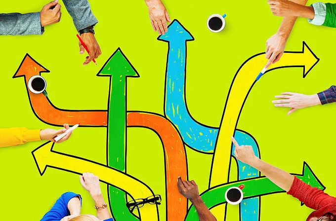 Professionals meeting over a changing directions arrow design decision-making concept
