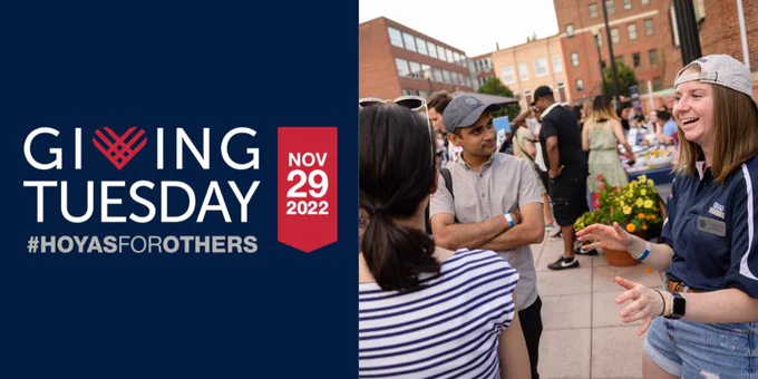 On the left side of the image is a dark blue background with gray text that reads "Giving Tuesday #HoyasForOthers" and a red banner with the date "Nov 29 2022"; on the right is a picture of a group of graduate students at an event on the Car Barn patio in early fall