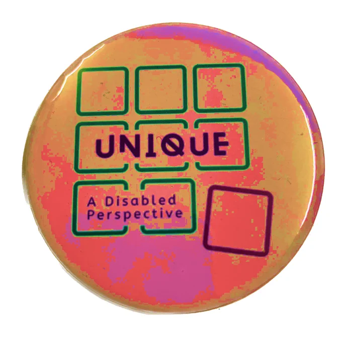 My badge from the exhibition featuring the name of the exhibition - I have recoloured the badge to make it 'unique'. 