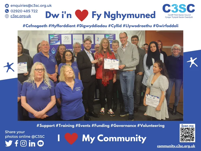 A photo with the nominees and the winners of the Cardiff Volunteer Awards in a frame with a phrase 'I (heart) my community'