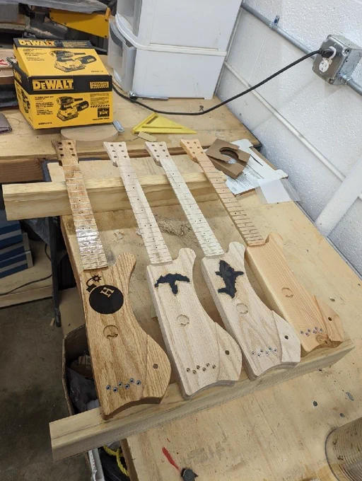 Mini electric guitars made by students.