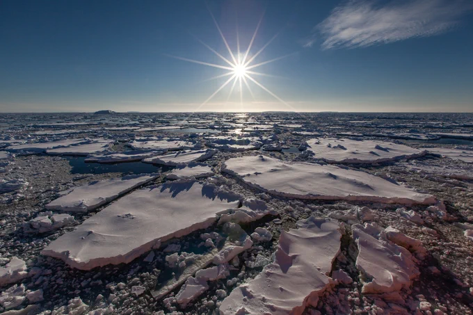 Ice floes under sun, photo by Pete Harmsen