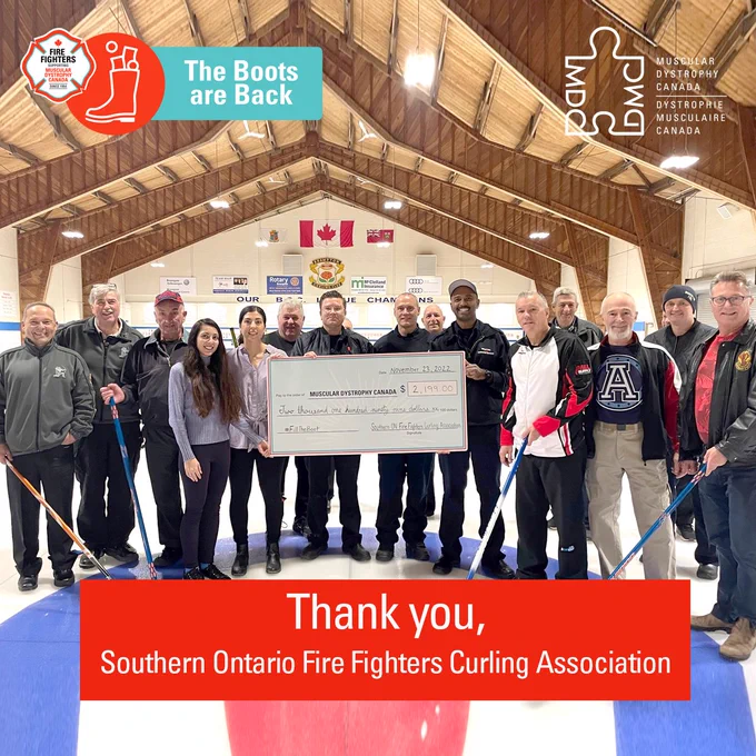 Photograph of members of the Southern Ontario Fire Fighters Curling Association and MDC staff with a cheque.