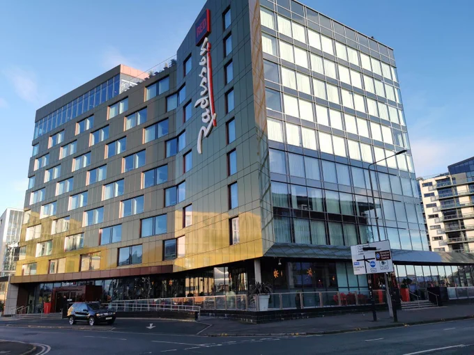 Image of the exterior of a Radisson hotel.  