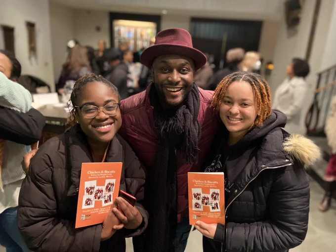 MIT students Bukunmi Shodipo and Tamea Cobb pose with playwright Douglas Lyons at opening night of Chicken & Biscuits