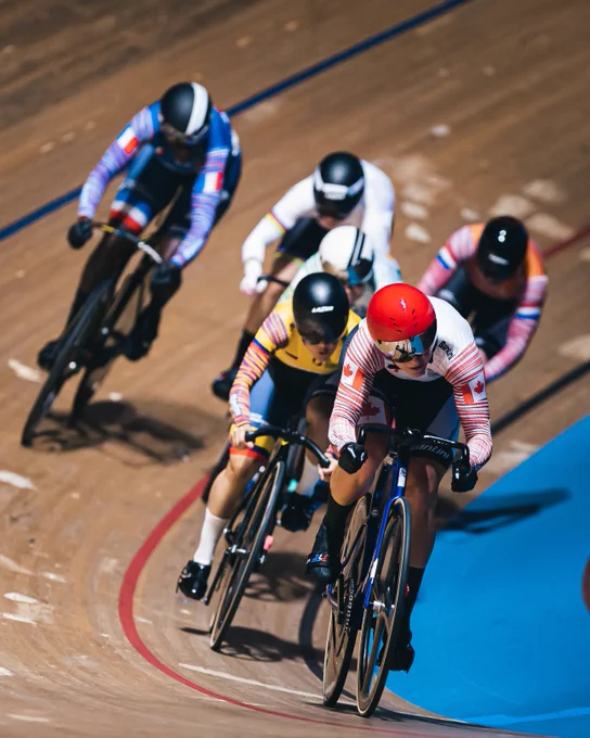 Kelsey Mitchell competes during a cycling race
