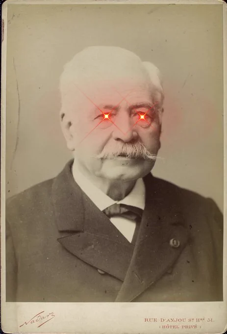 Old b/w portrait of Ferdinand de Lesseps with laser eyes